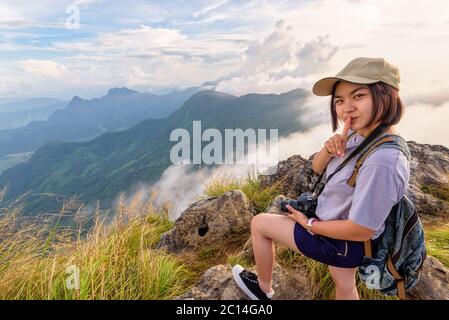 Hiker girl with happy on Phu Chi Fa Mountain Stock Photo
