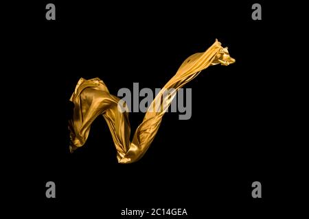 golden soft satin flying in wind on background Stock Photo