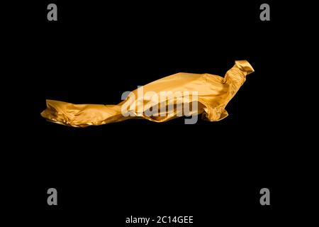 golden soft satin flying in wind on background Stock Photo