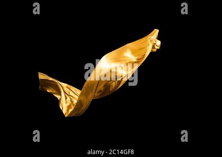 golden soft satin flying in wind on background Stock Photo