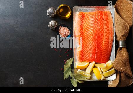 Raw salmon fillet and ingredients for cooking Stock Photo