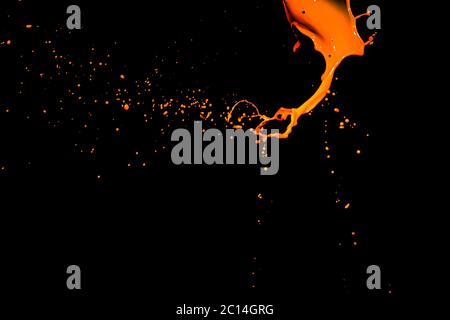 isolated orange water splash on background Stock Photo