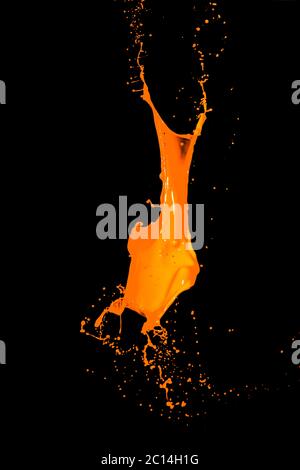 isolated orange water splash on background Stock Photo