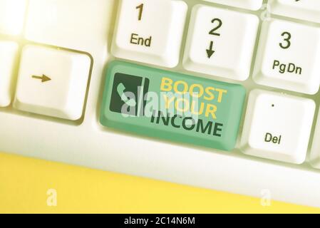 Text sign showing Boost Your Income. Business photo text improve your business to increase revenue or profit Stock Photo