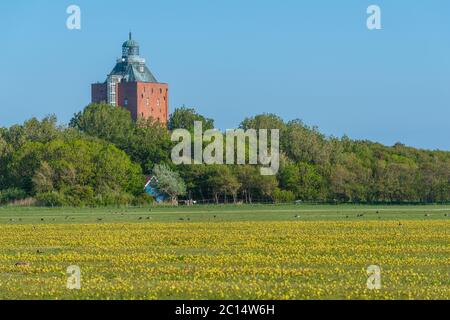 Oldest lighthouse of Germany, built in 1380, North Sea island of Neuwerk, Federal State of Hamburg, North Germany, Unesco World Heritage Stock Photo