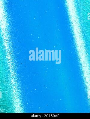 Fragment of colorful graffiti painted on a concrete wall. Bright purple abstract background for design. Stock Photo