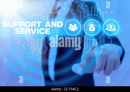Writing note showing Support And Service. Business concept for Technical Assistance Customer Service Business Technology Internet Stock Photo