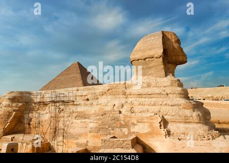 The famous Great Sphinx of Giza and one of the great pyramids in Egypt Stock Photo