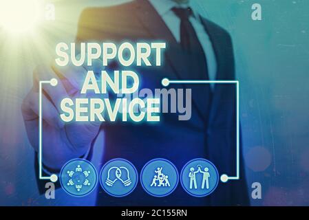 Writing note showing Support And Service. Business concept for Technical Assistance Customer Service Business Technology Internet Stock Photo