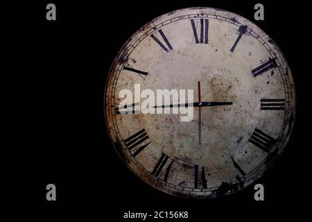 clock on a black background. Stock Photo