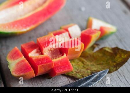 papaya slices on wooden. Stock Photo