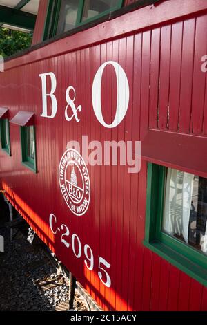 A red caboose from the B & O Railroad now a museum in Mount Airy Maryland in Carroll County Stock Photo