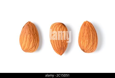 Three peeled almonds isolated on white background. Almonds are very popular nuts and high protein . healthy food. Stock Photo