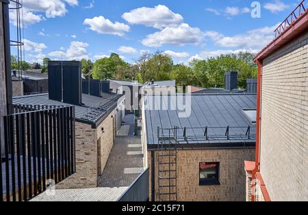 New residential building roofs on a sunny day Stock Photo