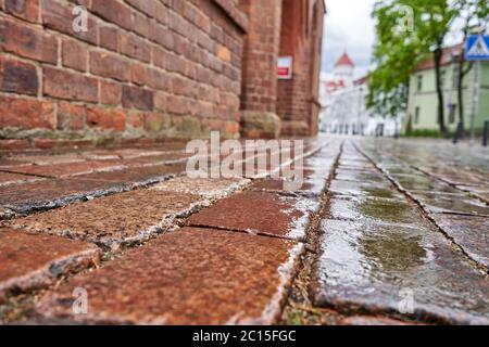 Wet stone pavement in the old town Stock Photo