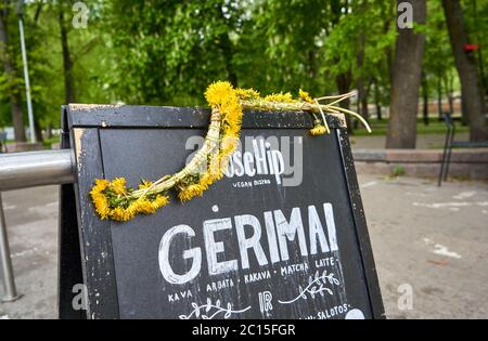 Restaurant sign attracting clients to visit in Vilnius Stock Photo