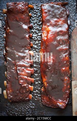 Rack of pork ribs with barbecue marinade/sauce Stock Photo