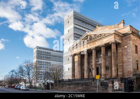 Former Church of St George's in the Fields beside high rise multi-storey flats in St George's Road, Woodlands, Glasgow. Stock Photo