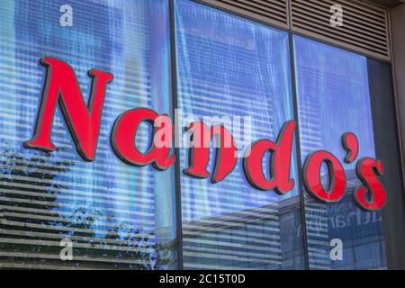 Nando's sign logo Stock Photo - Alamy