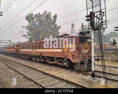 Editorial. Dated-18th April 2020, location - New Delhi.An Indian Frieght train. A forward view of outside the train door. Stock Photo