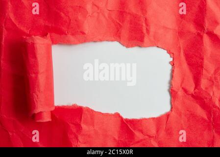 Rolled Ripped Torn Cardboard Placed Above A Wooden Classic Table Backdrop Stock Photo