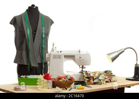 the sewing machine costs on a table Stock Photo