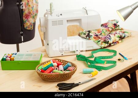 the sewing machine costs on a table Stock Photo