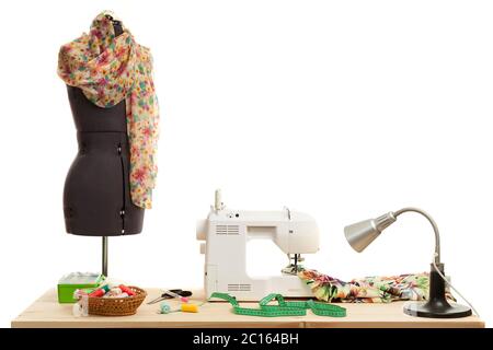 the sewing machine costs on a table Stock Photo