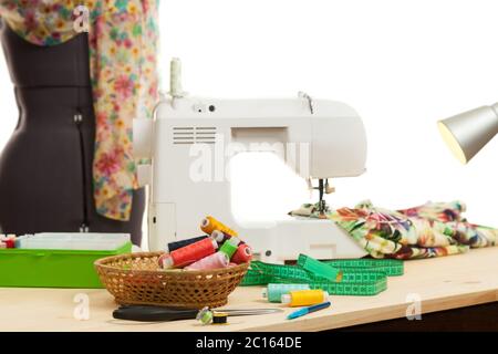 the sewing machine costs on a table Stock Photo