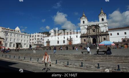 Quito, Pichincha / Ecuador - September 16 2018: People walking in the square in front of the Church and Monastery of San Francisco on a sunny day. It Stock Photo