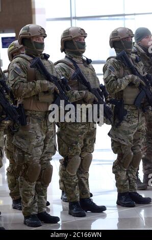 full body fully equipped soldier in tactical clothing and gear isolated ...