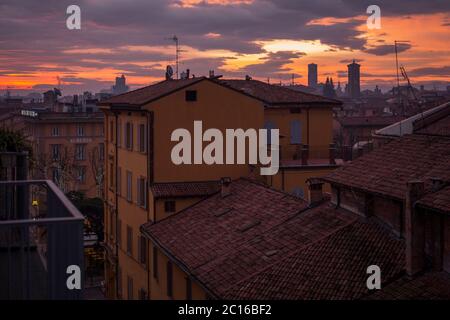 Bologna, February 10th of 2019. A view of the rooftops of Bologna during a cloudy sunset day in winter. Stock Photo