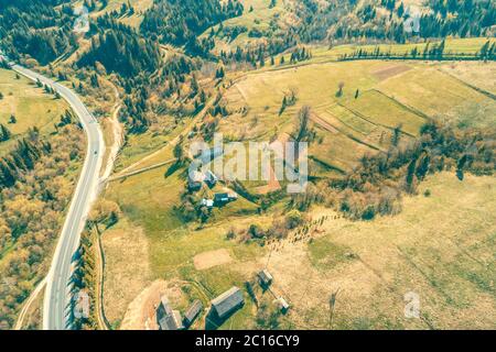 Aerial view of a mountain highway in spring. Beautiful mountain landscape. Carpathian mountains. Ukraine Stock Photo