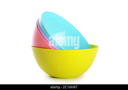Plastic colorful plates isolated on white Stock Photo