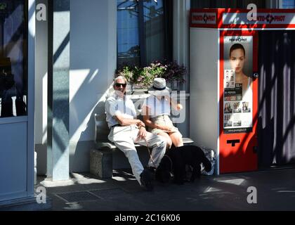 People in Wengen railway station on the Bernese Highlands Railway from Lauterbrunnen to Kleine Scheidegg, Switzerland. Stock Photo