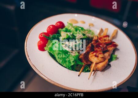 Salad rucola squid Shrimp asparagus ,  seafood salad at restaurant, close up view. Eating Asian Japanese food  leisure concept.  . Design healthy life Stock Photo