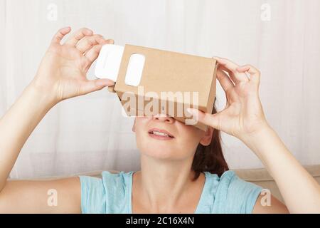 Women using cardboard virtual reality Stock Photo