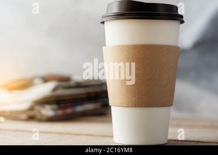 Cup of coffee on desk. Stock Photo
