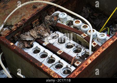 Old rusty and broken fuse box. Horizontal photo. Stock Photo