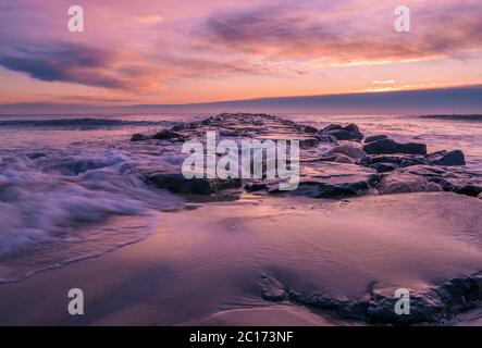 Beautiful peaceful sunrise over Jersey Shore in New Jersey Stock Photo -  Alamy