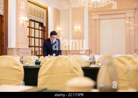 young man in modern dining room Stock Photo