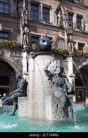 Fischbrunnen fountain and the sculptures on Marienplatz (Mary Square) in Munich in Germany Stock Photo