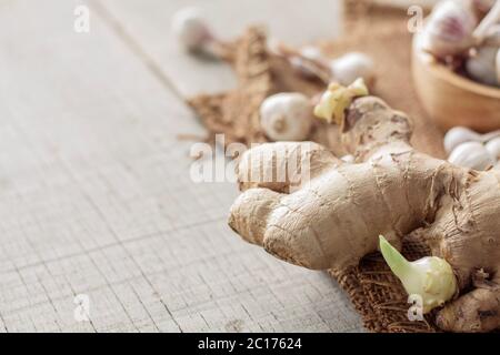 ginger is sprouting on wooden. Stock Photo