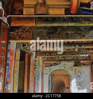 Hallway-polychrome ceiling frame-Duo Wen-North King of the Four-Heavenly-Kings-Buddhist-gods. Qianfo Grottoes-Zhangye-Gansu-China-0940 Stock Photo