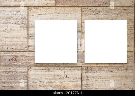 Two white blank signboards, information boards on the wall outdoors Stock Photo
