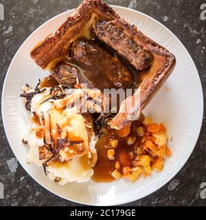 Toad in the hole Stock Photo