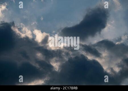 The wonder of nature,  Cumulusnimbus cloud formations on a warm spring evening in skies over the United Kingdom. Stock Photo