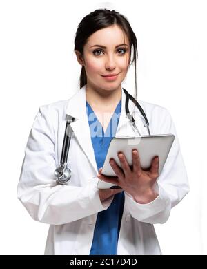 Smiling nurse portrait isolated on white using a digital tablet Stock Photo