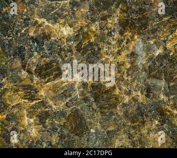 Close-up detail of dark brown and green Uba Tuba granite texture, pattern or background Stock Photo