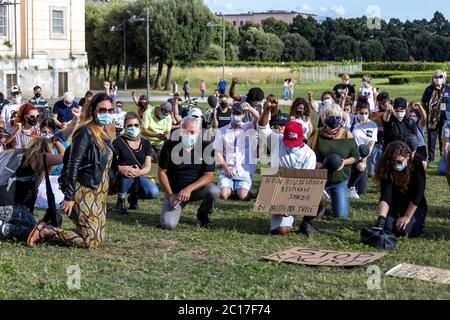Caserta, Italy. 14th June, 2020. A flash mob to demand justice for George Floyd was held today June 14 at 18 in front of the Palace of Caserta. An initiative launched by Francesca Tortora. They observed 8 minutes and 46 seconds of silence, as long as George's agony lasted. (Photo by Alessandro Barone/Pacific Press) Credit: Pacific Press Agency/Alamy Live News Stock Photo